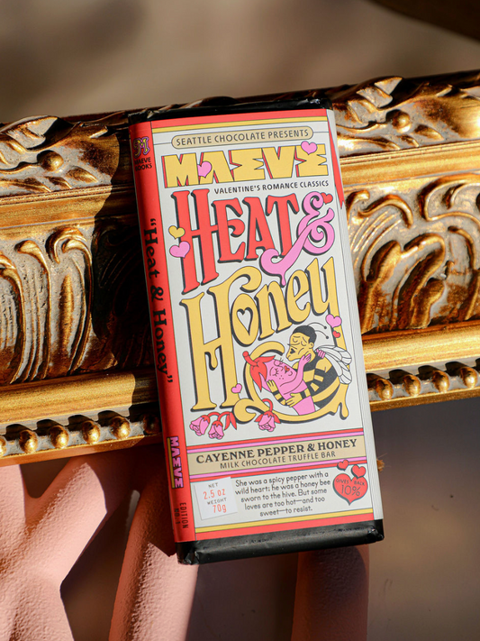 Heat & Honey milk chocolate truffle bar by Maeve Books with colorful Valentine's themed packaging.