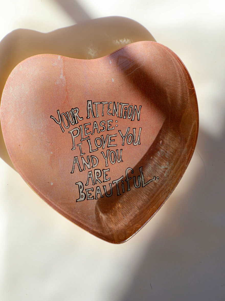 Heart decoupage plate with text by Unknown featuring glossy accents and shadow details.