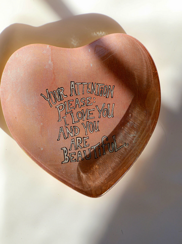 Heart decoupage plate with text by Unknown featuring glossy accents and shadow details.