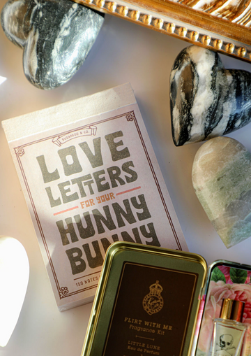 Love letters notepad by Sugarboo & Co., with a decorative frame and marble heart decorations.
