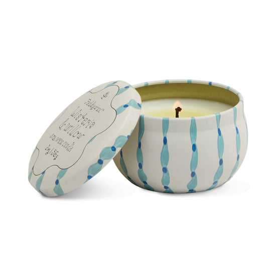 Printed tin candle by Paddywax with wisteria and willow scent, featuring blue pattern on white metal.