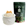 Dip mix by To Market to Market, next to a bowl of prepared dip with crackers.
