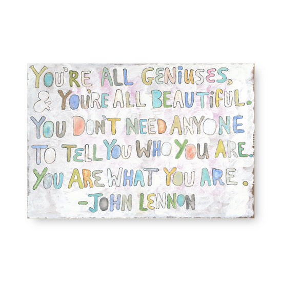 Painted art tile by John Lennon featuring a motivational quote on a textured white background.
