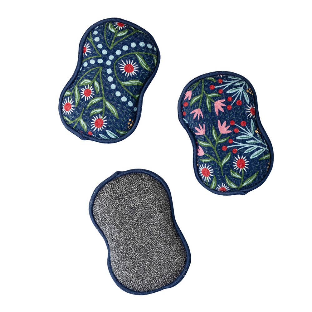 Set of three reusable navy sponges from RJW Glitz, one with a floral pattern, one with gray abrasive texture.
