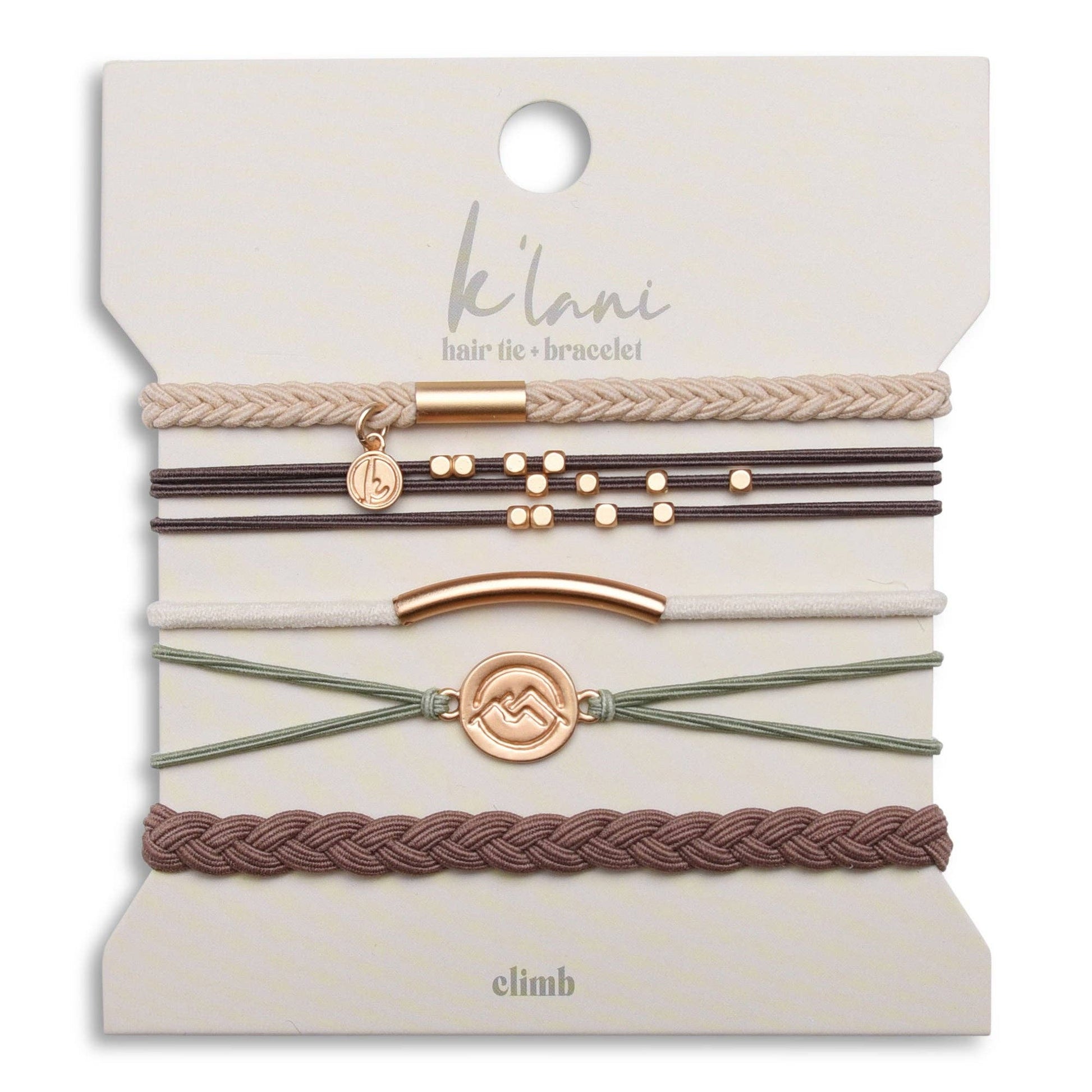 Set of hair tie bracelets with mountain peak charms by k'lani, featuring gold-toned accents and woven elastic bands.
