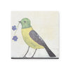 Square art tile from the Art Tile Collection featuring a colorful bird with flowers.