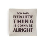 Small square decoupage plate featuring a quote on a light-colored background.
