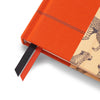 Orange fabric journal by Papier featuring a leopard print design, with a black and orange ribbon bookmark.
