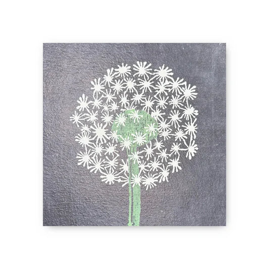 Square art tile by Art Tile Collection with a white dandelion design on a gray textured background.
