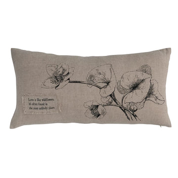 Beige lumbar pillow with wildflower design by Park Designs, featuring a fringed fabric patch with an inspirational quote.