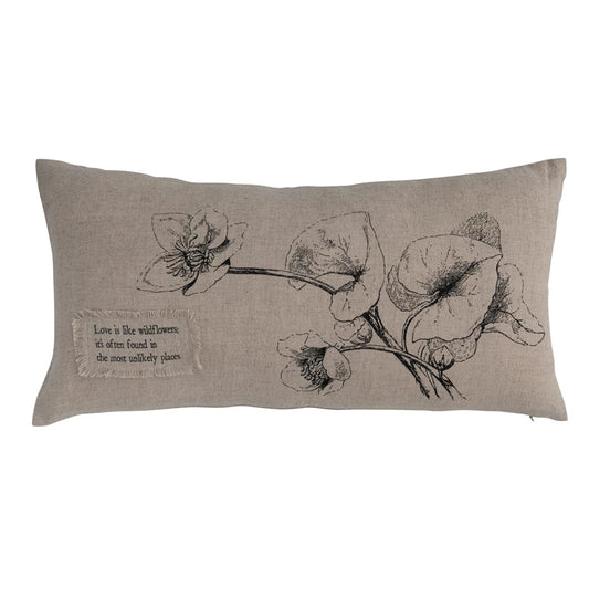 Beige lumbar pillow with wildflower design by Park Designs, featuring a fringed fabric patch with an inspirational quote.