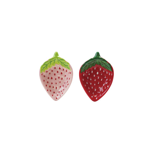 Two strawberry-shaped ceramic dishes on a white background
