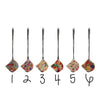 Set of six floral tape measures on a white background