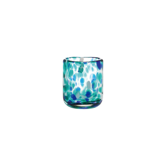 Glass shot glass with blue and green pattern on a white background