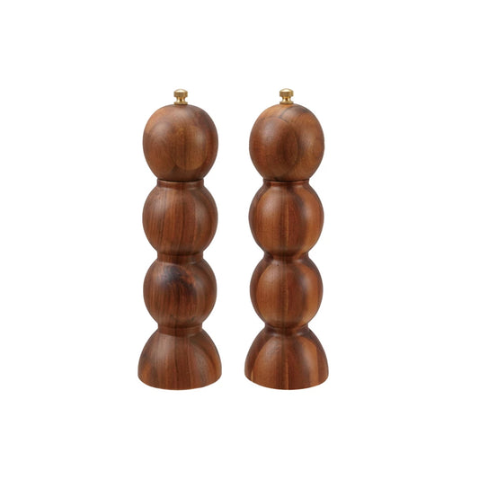 Set of two acacia wood salt and pepper mills with brass knobs by Williams Sonoma.