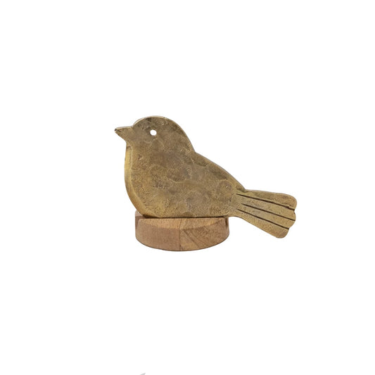 Hand-forged metal bird cheese knife from Foreside Home and Garden, sitting on a small wooden base.