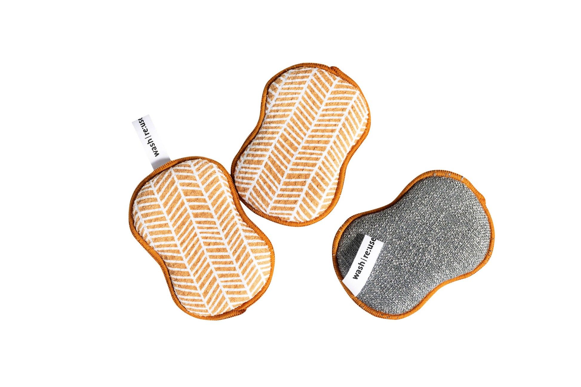 Reusable sponge set of three by RE:Use, featuring a branch pattern in gold with tan trim.