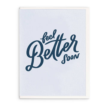 Letterpress greeting card with "feel better soon" message, framed in white.