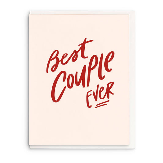 Letterpress wedding greeting card with "Best Couple Ever" in red lettering on a cream-colored background.