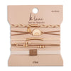Gold sun hair tie bracelet set by K'Lani, featuring multiple elastic bands with decorative elements.