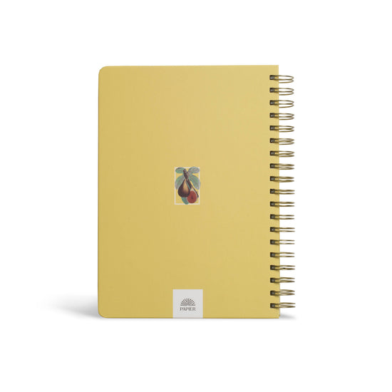 Yellow hardcover B5 spiral journal by Papier with hanging fruit graphic on the back.