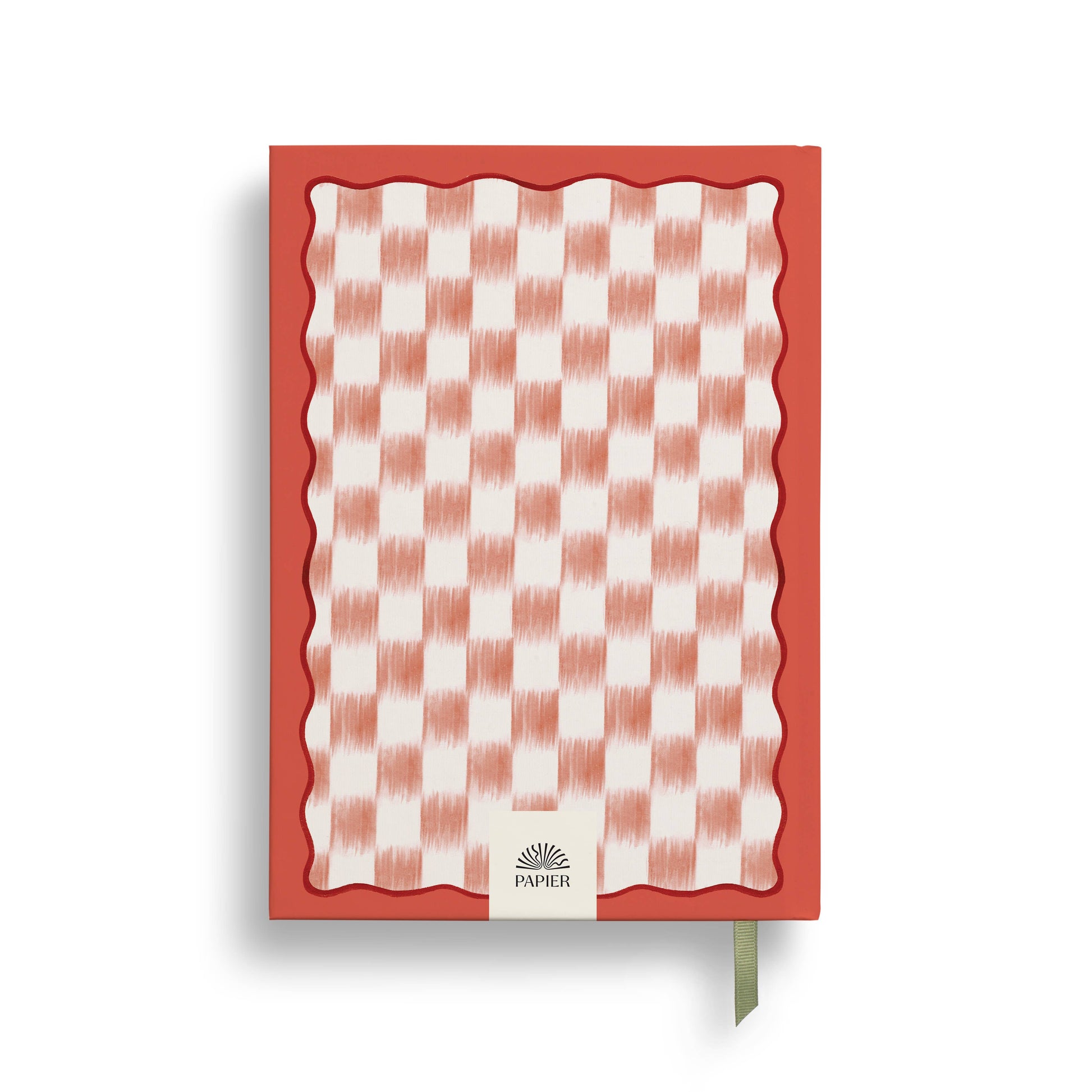 Hardcover A5 wellness journal by Papier with a red wavy trim and floral ikat checkered pattern.
