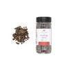 Mulling spice blend by Spiceology next to a pile of the spice pieces.
