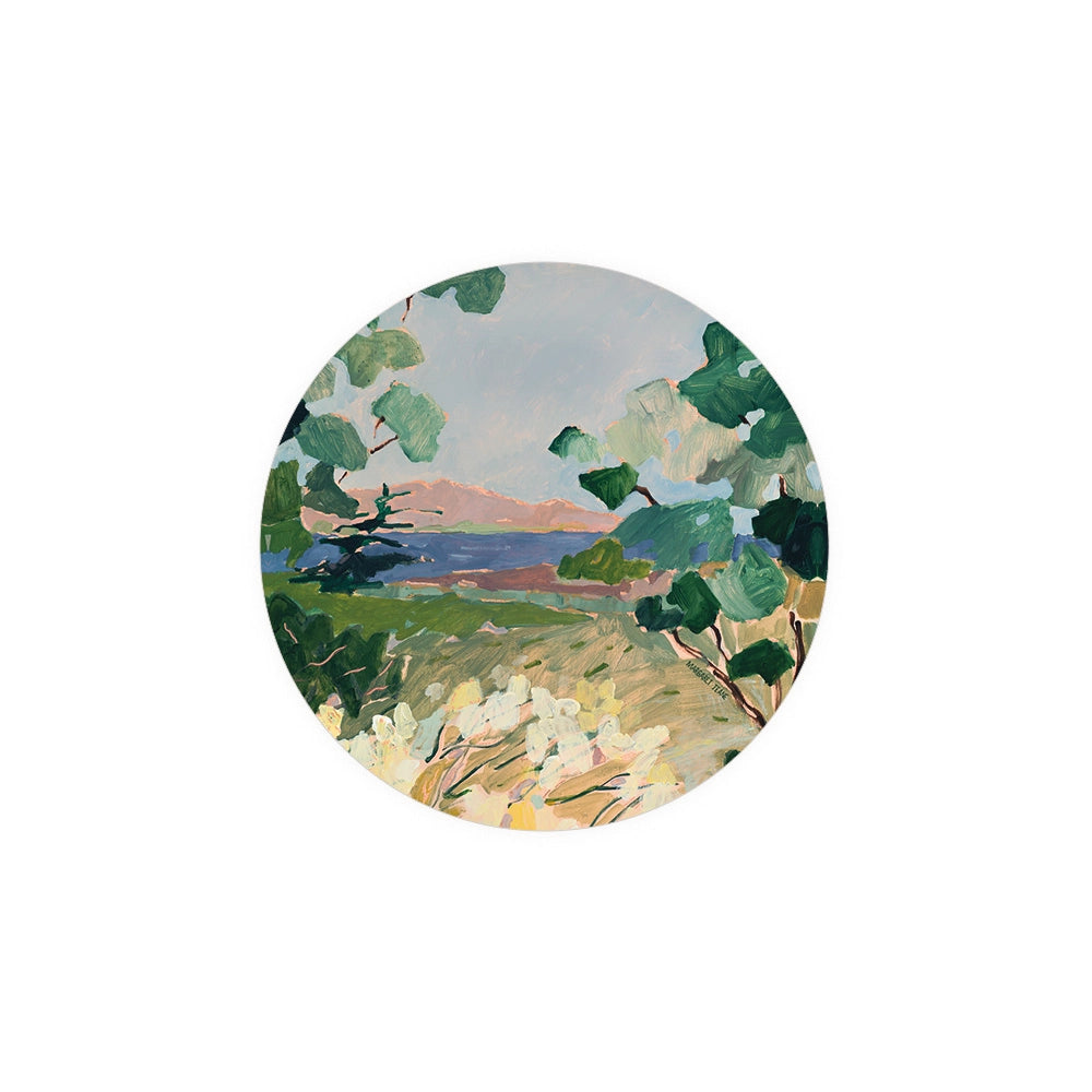 Decorative coasters of an abstract landscape scene by Margaret Feake, featuring green trees, white flowers, and a distant lake.
