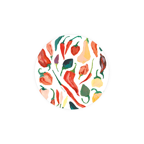Set of circular coasters with chili pepper pattern by Margaret Schenk.