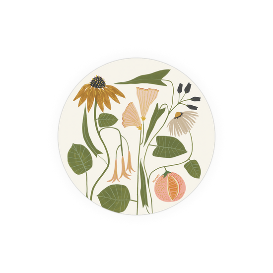 Botanical print coaster by Magnolia Home with orange, yellow, and white flowers.