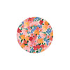 Floral coasters by Margaret Teaa with red, orange, blue and green blossom pattern.