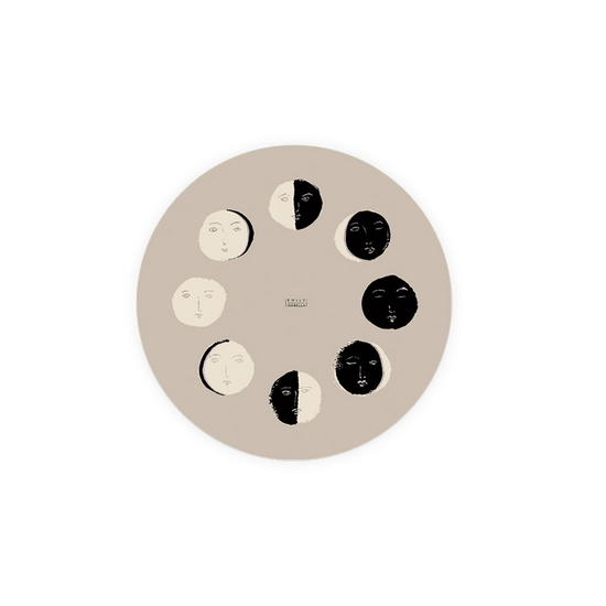 Set of round coasters by Seedlings, decorated with stylized crescent moon phases.