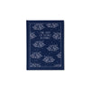 Blue bound notepad with "The Art of Doing Nothing" text, with a decorative cloud and star pattern.