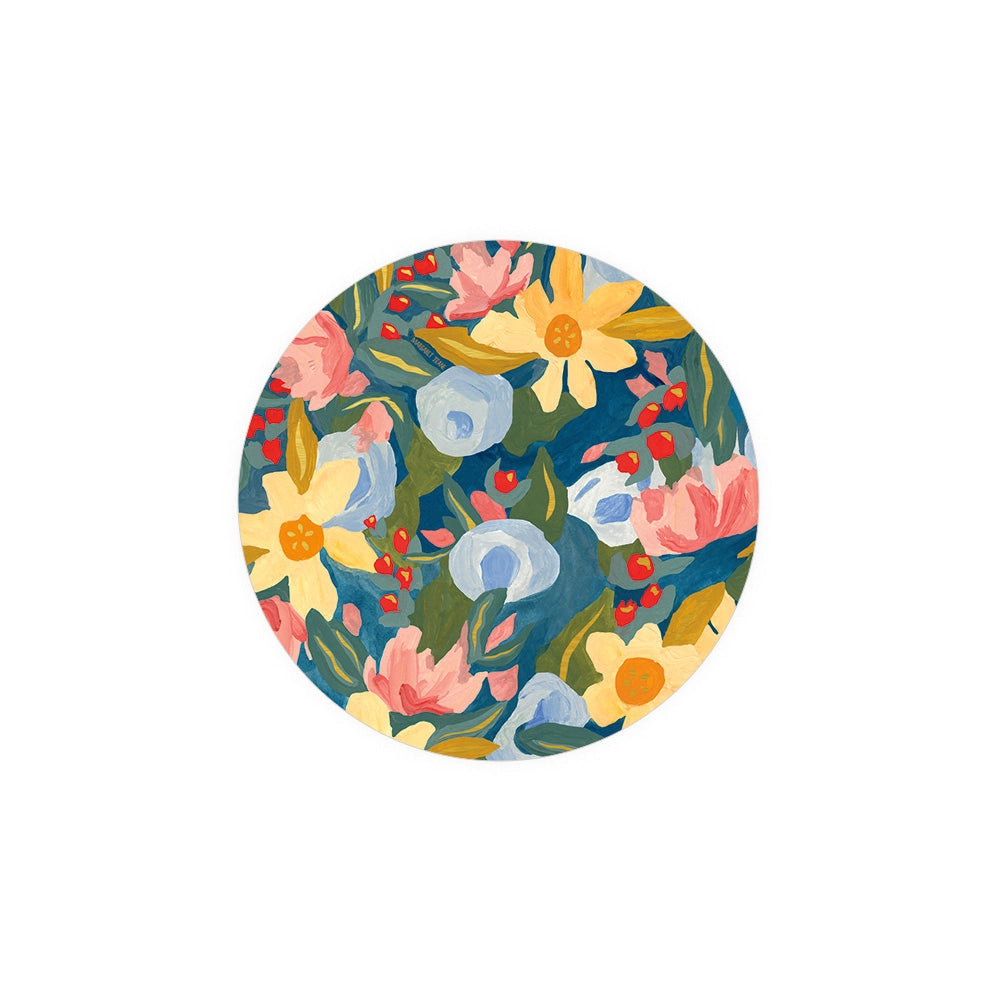 Floral printed coaster from Seedlings, showcasing flowers and berries in shades of pink, yellow, and blue.