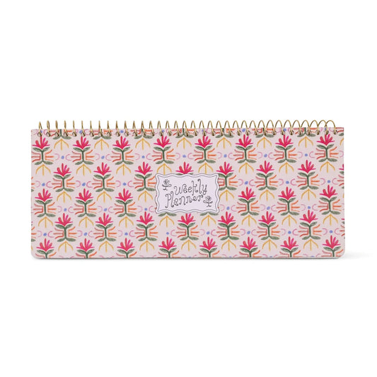 Tropical weekly planner pad with a floral pattern.