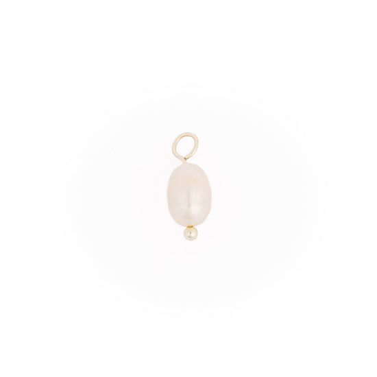 White pearl charm with gold accents.
