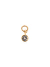Gold-tone charm with a gemstone by Pilgrim, featuring a clear, faceted crystal.