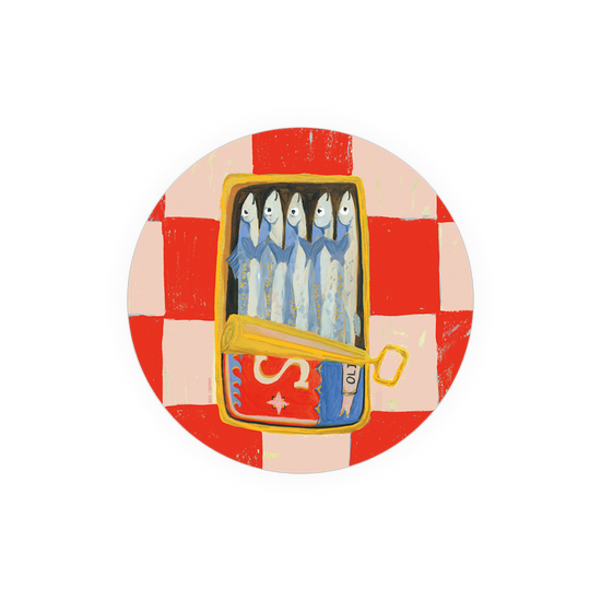 Round sardine coaster with a red and pink checkered pattern.