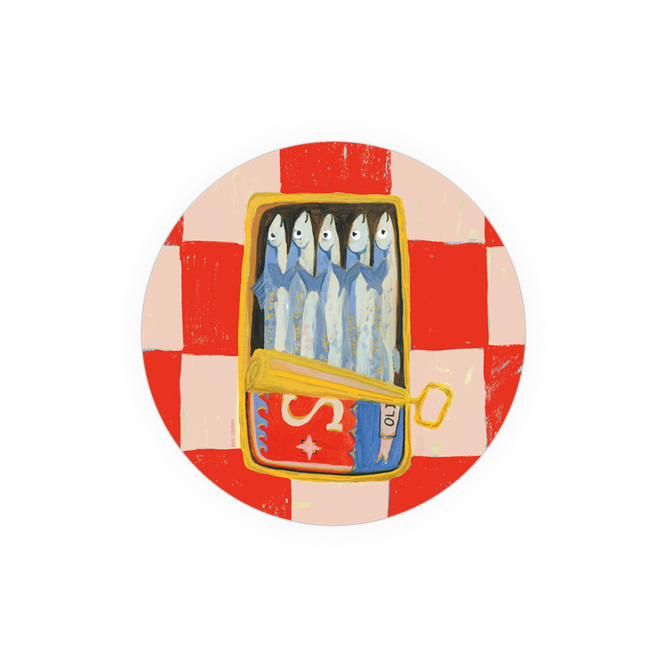 Round sardine coaster with a red and pink checkered pattern.