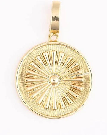 Gold coin charm from Sophie Coin Charms, featuring a radial pattern and a textured surface.