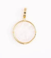 Gold coin charm for jewelry by Sophie, featuring a white stone center.
