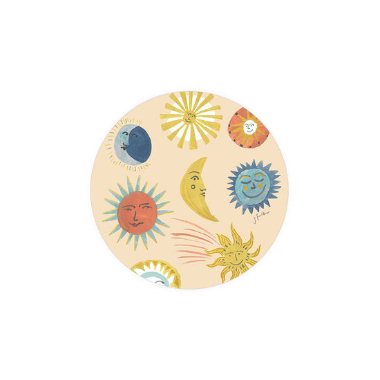 Set of round coasters with celestial designs by J. Frank Co, featuring sun and moon illustrations on a beige background.

