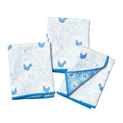 Set of three reversible mini towels by Once Again, patterned with blue birds and floral accents.
