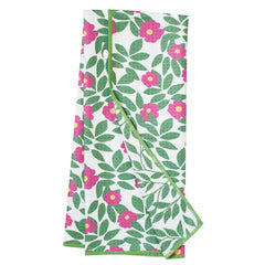 Reversible Anywhere Towel from Once Again with a floral and leaf pattern and a green border.