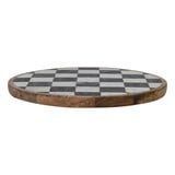 Round mango wood and marble lazy susan with checkerboard pattern.