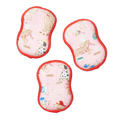 Set of three pink reusable sponges with a dog pattern.
