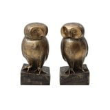 Pair of bronze owl bookends on dark bases.