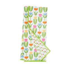 Reversible towel with floral pattern from Once Again Anywhere Towels, with a green border and a white background.
