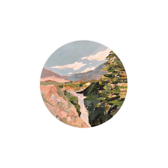 Round art print coasters depicting a landscape, from an aerial point of view.