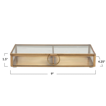 Brass and glass display box with center handle and a rectangular shape.